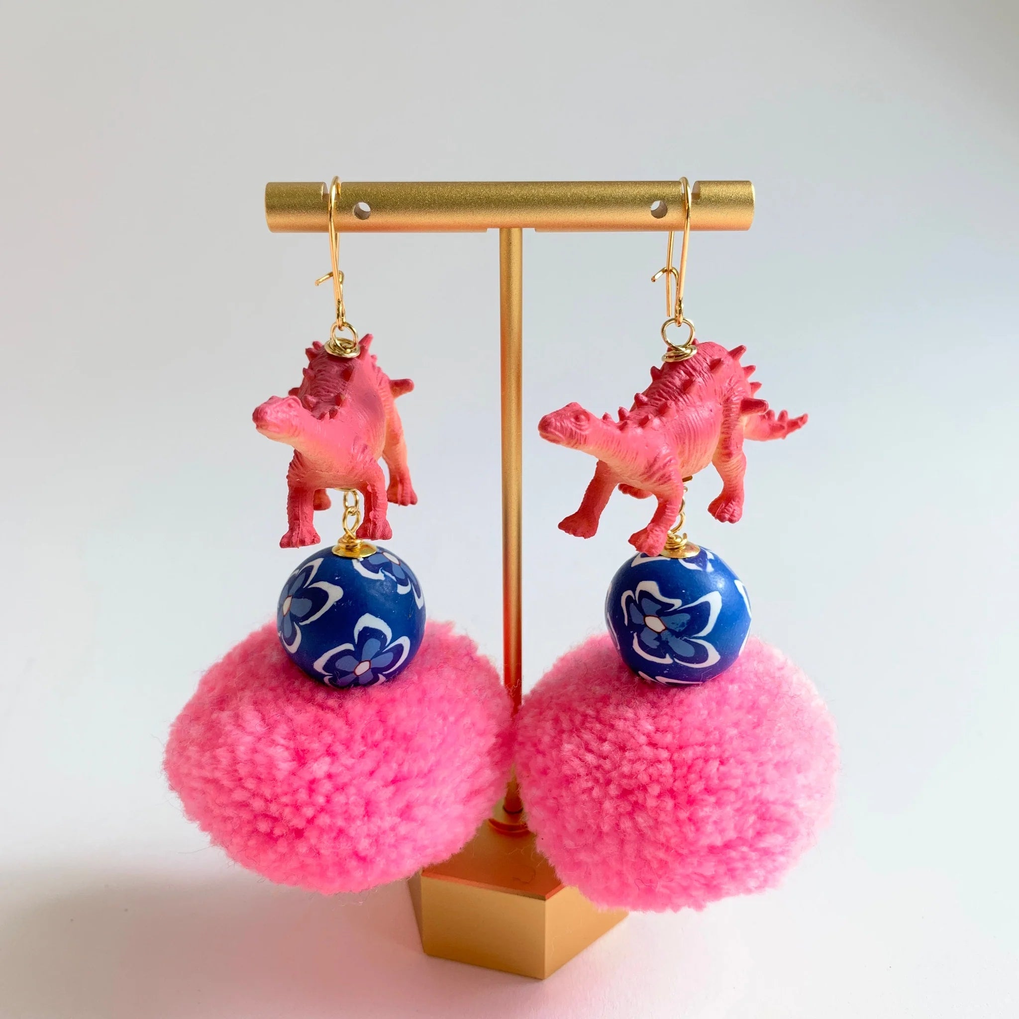 Lenora Dame Pink Pom Pom Dinosaur Earrings